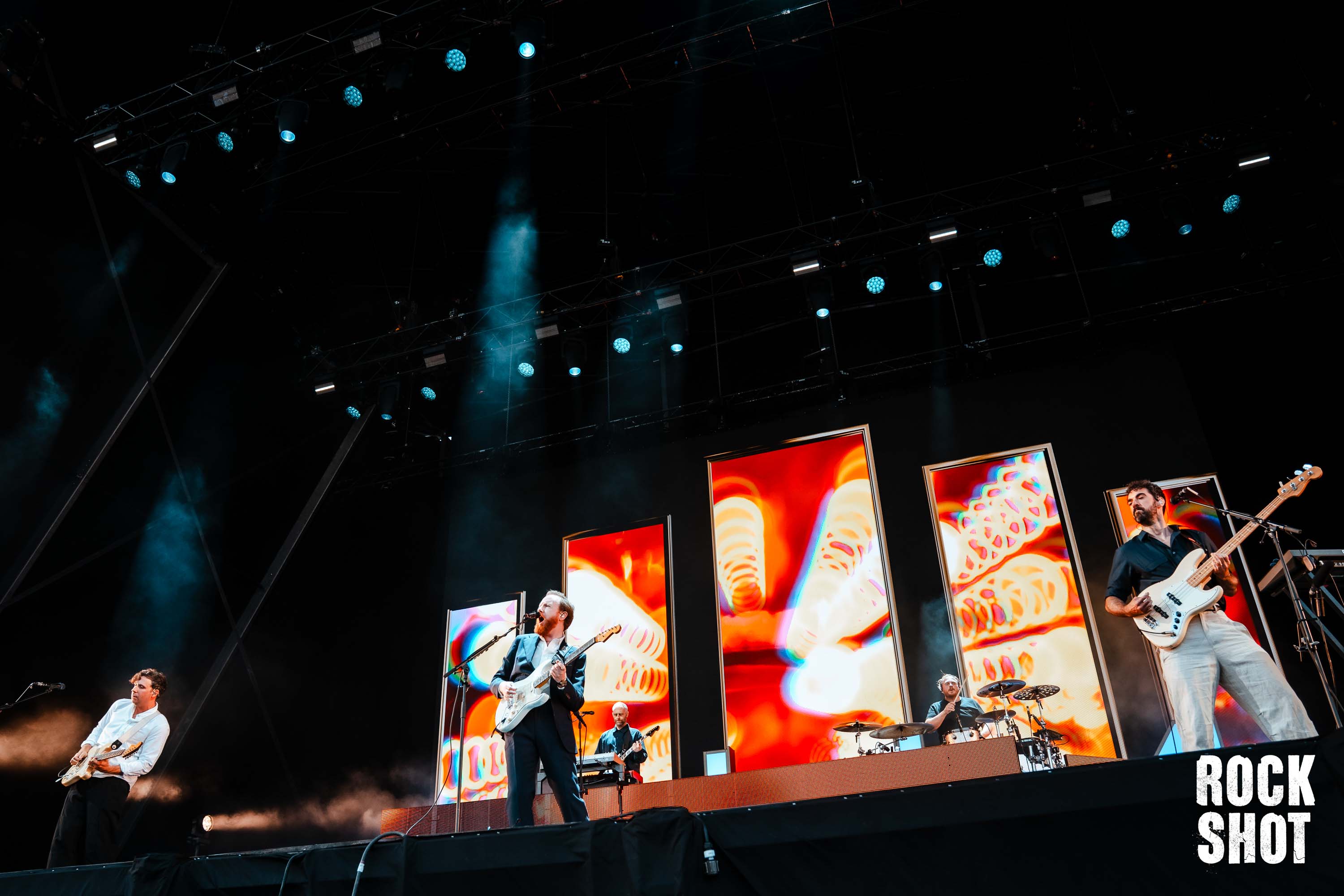 Two Door Cinema Club performing live on stage